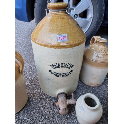 1020 - Seven old stoneware bottles. 