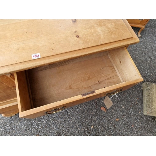 1041 - A Victorian pine chest of drawers, with one cupboard door, 96.5cm wide x 46.5cm deep x 76.5cm high.... 