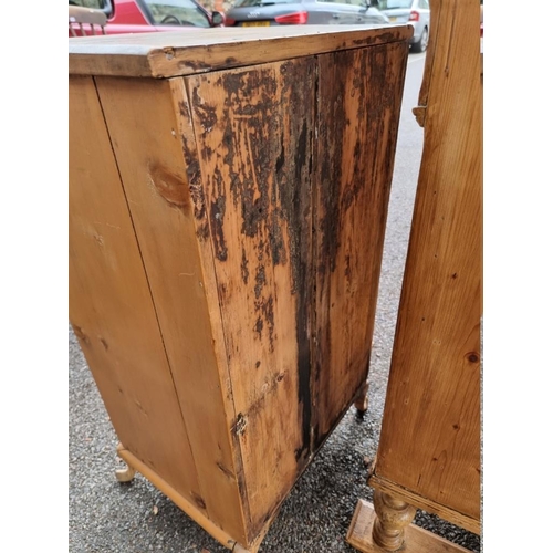 1042 - An antique pine side cabinet.