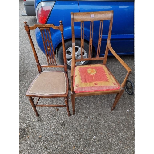 1049 - An Edwardian inlaid armchair; together with another armchair.