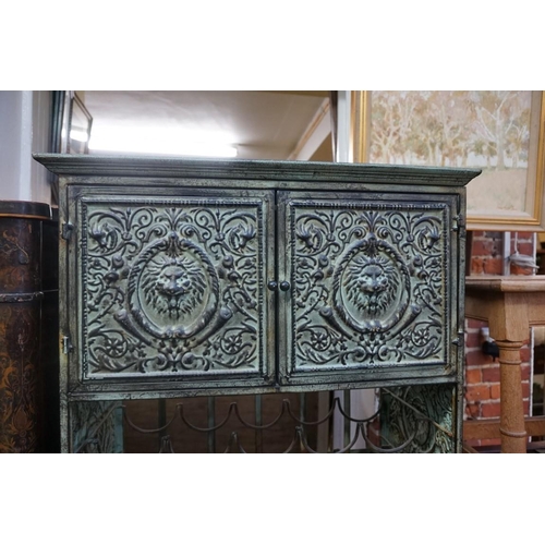 1076 - A verdigris metal wine cabinet, 64.5cm wide. 