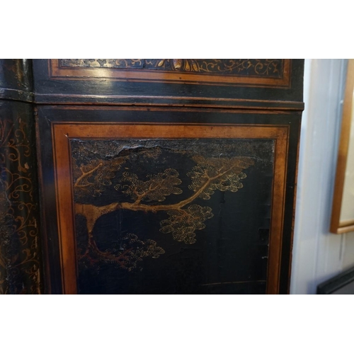 1077 - A Regency ebonized and gilt chinoiserie lacquered side cabinet, 121cm wide, (a.f.).... 