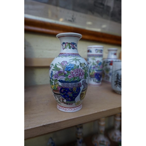 1096 - Twelve Chinese and Japanese vases and jars, largest 31cm high. 