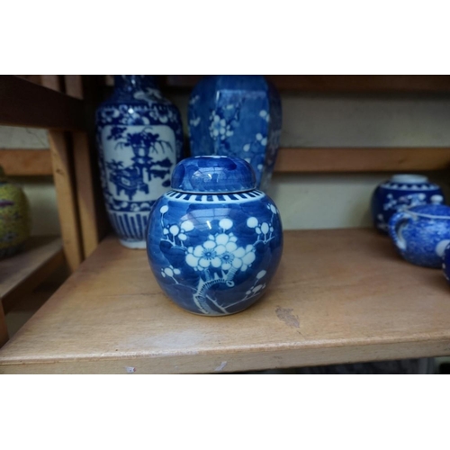 1098 - A collection of Chinese and Japanese blue and white porcelain, largest 27cm high. (12)... 