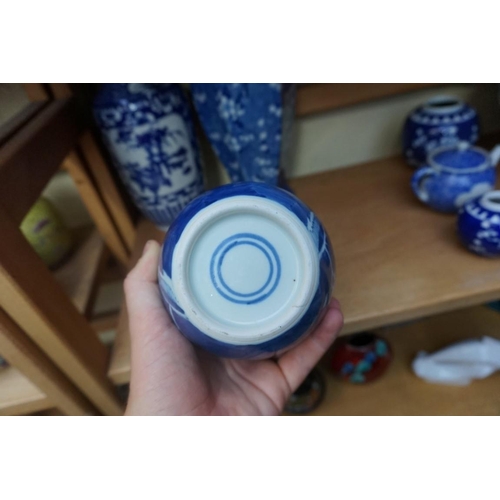 1098 - A collection of Chinese and Japanese blue and white porcelain, largest 27cm high. (12)... 