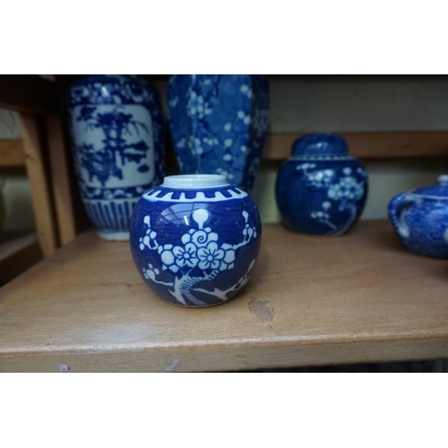 1098 - A collection of Chinese and Japanese blue and white porcelain, largest 27cm high. (12)... 