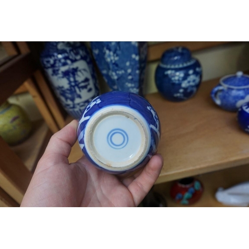 1098 - A collection of Chinese and Japanese blue and white porcelain, largest 27cm high. (12)... 