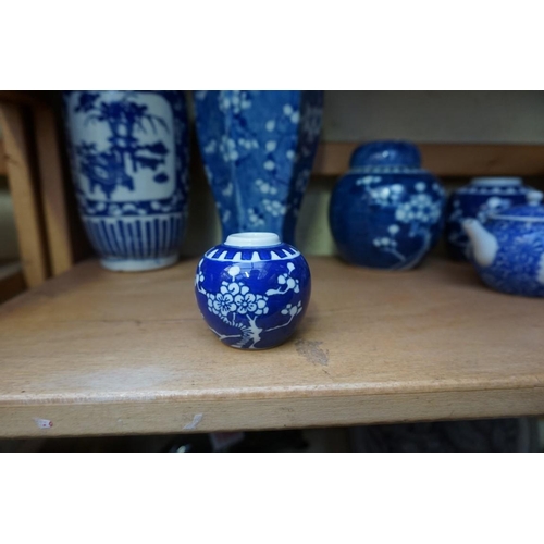 1098 - A collection of Chinese and Japanese blue and white porcelain, largest 27cm high. (12)... 