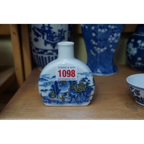 1098 - A collection of Chinese and Japanese blue and white porcelain, largest 27cm high. (12)... 