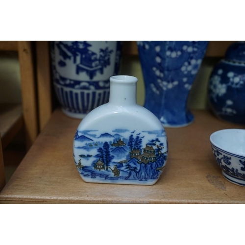 1098 - A collection of Chinese and Japanese blue and white porcelain, largest 27cm high. (12)... 