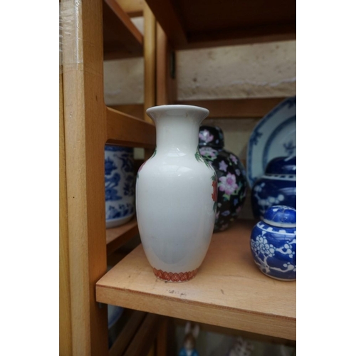 1109 - A collection of Chinese and Japanese pottery and porcelain, largest 17cm high. (12)