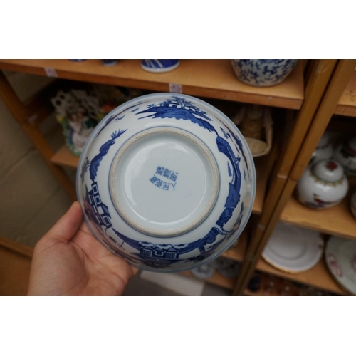 1115 - A collection of Chinese and Japanese blue and white ceramics, largest 25cm. (16)... 