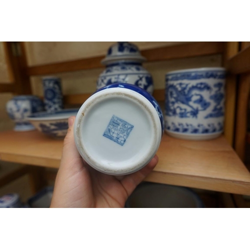 1115 - A collection of Chinese and Japanese blue and white ceramics, largest 25cm. (16)... 