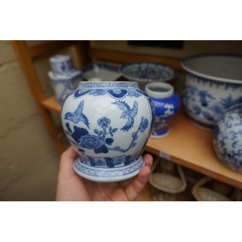 1115 - A collection of Chinese and Japanese blue and white ceramics, largest 25cm. (16)... 