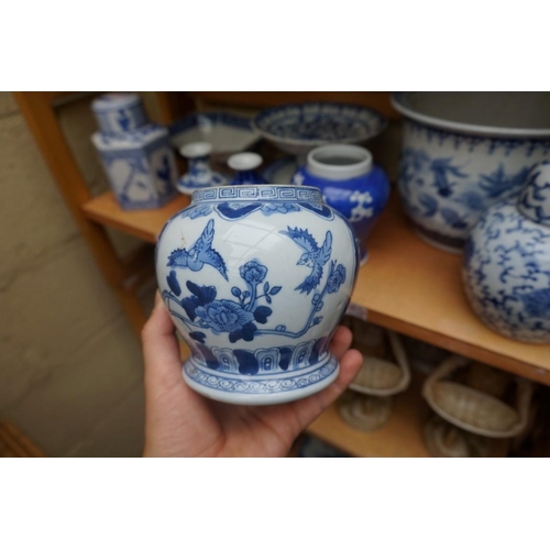 1115 - A collection of Chinese and Japanese blue and white ceramics, largest 25cm. (16)... 