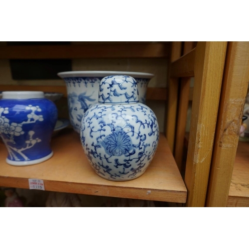 1115 - A collection of Chinese and Japanese blue and white ceramics, largest 25cm. (16)... 