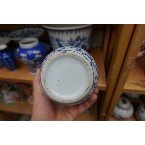 1115 - A collection of Chinese and Japanese blue and white ceramics, largest 25cm. (16)... 