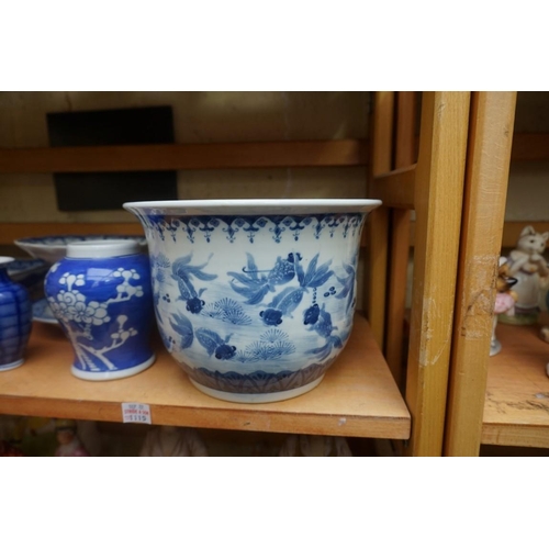 1115 - A collection of Chinese and Japanese blue and white ceramics, largest 25cm. (16)... 