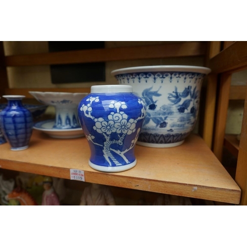 1115 - A collection of Chinese and Japanese blue and white ceramics, largest 25cm. (16)... 