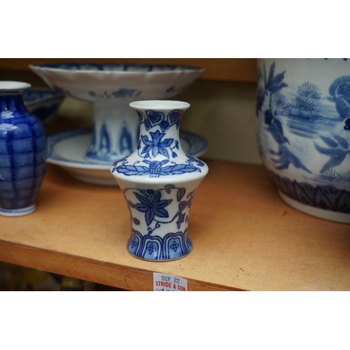 1115 - A collection of Chinese and Japanese blue and white ceramics, largest 25cm. (16)... 