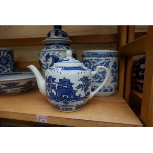 1115 - A collection of Chinese and Japanese blue and white ceramics, largest 25cm. (16)... 