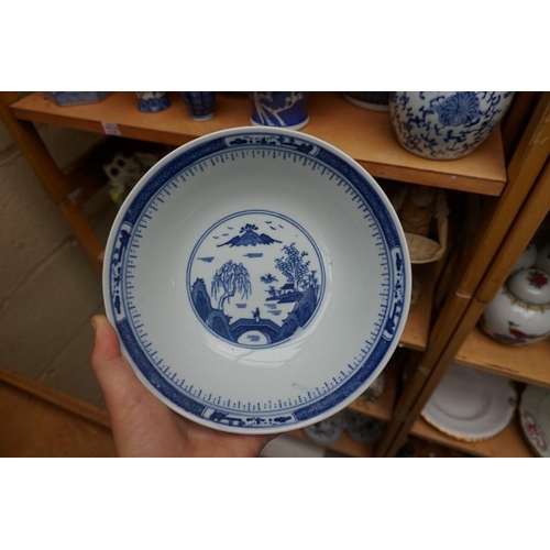 1115 - A collection of Chinese and Japanese blue and white ceramics, largest 25cm. (16)... 