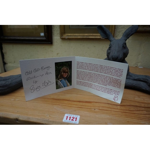 1122 - Studio Pottery: a Suzie Marsh sculpture of a reclining hare, 58cm wide, with signed booklet. ... 