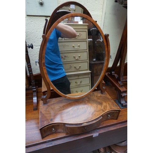 1125 - Three George III mahogany box base toilet mirrors, two with bone handles; together with another 19th... 