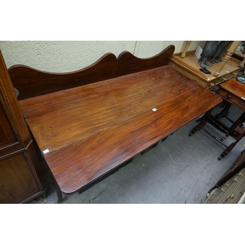 1126 - A 19th century mahogany side table, with drop leaf front and gallery back, 151cm wide, (alterat... 