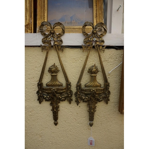 1144 - A pair of neo-classical style lacquered brass furniture mounts, 45cm high.