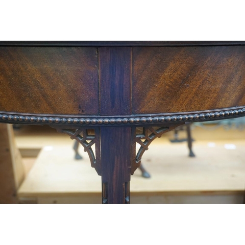 1160 - A 1920s mahogany demi-lune card table, 84cm wide.