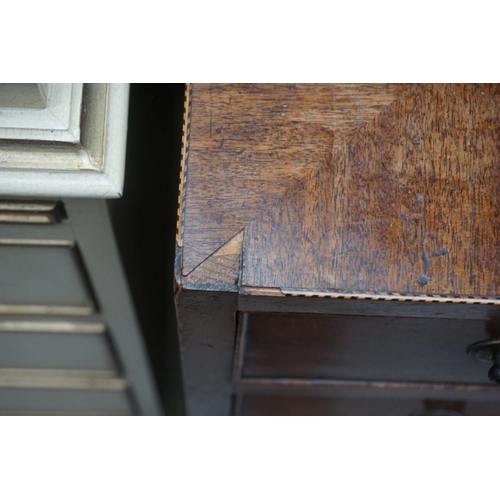 1162 - A George III mahogany caddy top four drawer chest, with chequer strung edging to the top, 84cm ... 