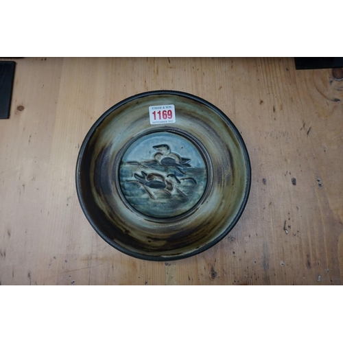 1169 - Studio Pottery: a mixed group of items, to include a Petra Tilly stoneware plate, 36cm wide; togethe... 