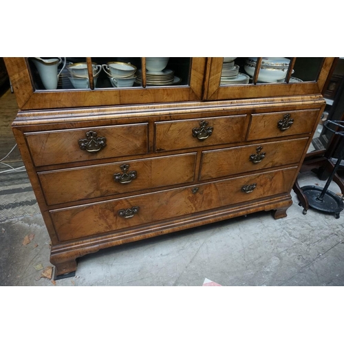 1177 - A good 1930s, 18th century style, walnut double dome top bookcase, 123cm wide.