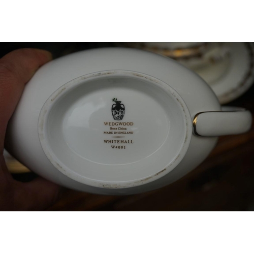 1180 - A Wedgewood 'Whitehall' pattern part dinner service; together with another Royal Worcester... 