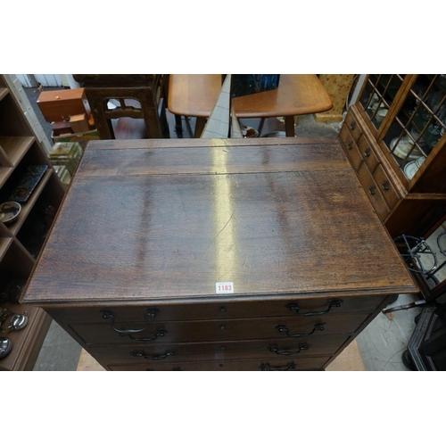 1183 - A small antique oak chest of four long graduated drawers, 68.5cm high x 73.5cm wide x 50cm deep... 