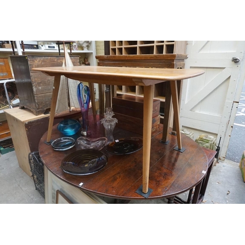 1193 - A vintage Ercol dining table, circa 1950s, 135.5cm long.