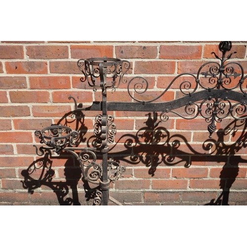 1198 - A large and impressive wrought iron fire grate, 101.5 x 122.5cm. 