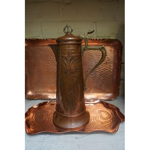 1216 - A WMF Art Nouveau copper and brass jug, 29cm high; together with a Keswick style rectangular tray, 3... 