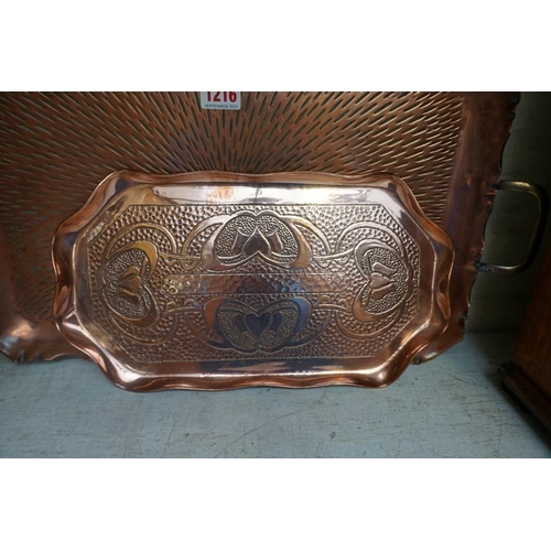 1216 - A WMF Art Nouveau copper and brass jug, 29cm high; together with a Keswick style rectangular tray, 3... 