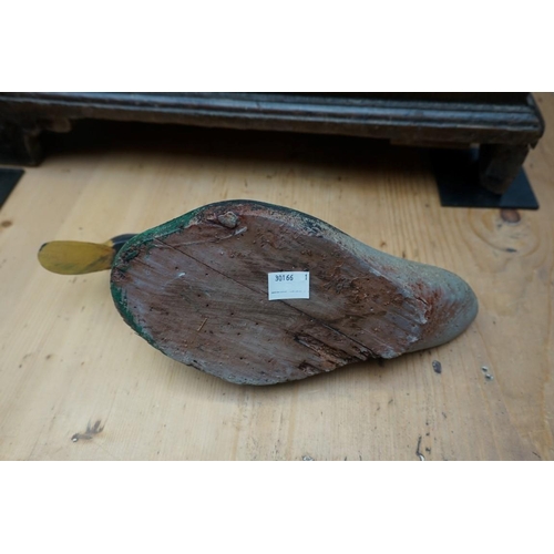 1218 - A painted wood decoy duck, 29.5cm long. 