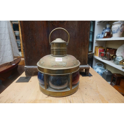 1223 - A copper ship's lantern; together with a similar brass example. (2)