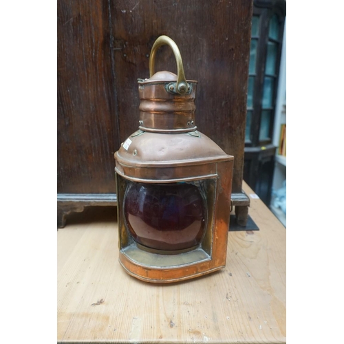 1223 - A copper ship's lantern; together with a similar brass example. (2)