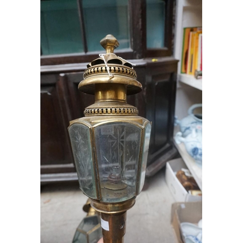 1228 - Two similar brass wall lanterns, each bearing copper plaque inscribed 'Line House Lamp Co'.... 