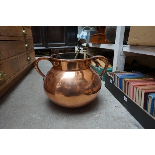 1240 - A copper twin handled vessel, 34.5cm wide; together with a coopered oak bowl; and three others. ... 