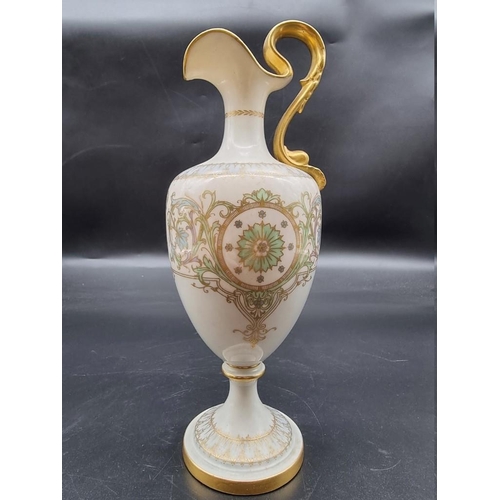 1248 - A Royal Worcester ewer, circa 1953, shape no. 2711, of claret jug form, painted with a panel of frui... 