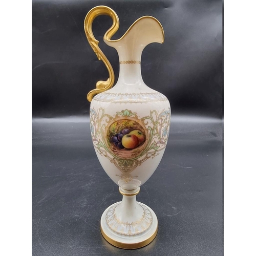 1248 - A Royal Worcester ewer, circa 1953, shape no. 2711, of claret jug form, painted with a panel of frui... 