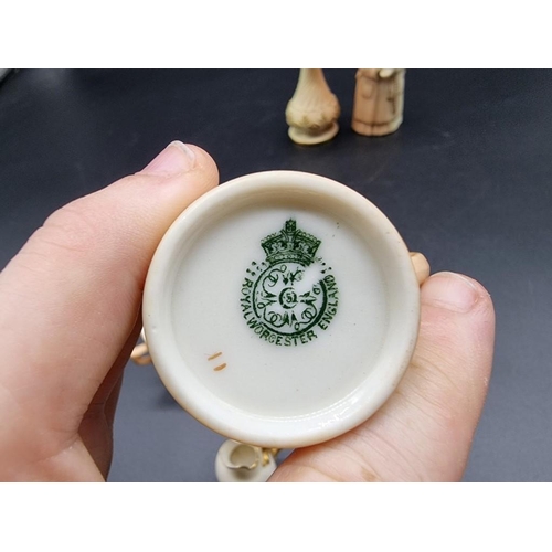 1251 - A small group of Royal Worcester miniature blush ivory items, comprising: a coffee can, painted with... 