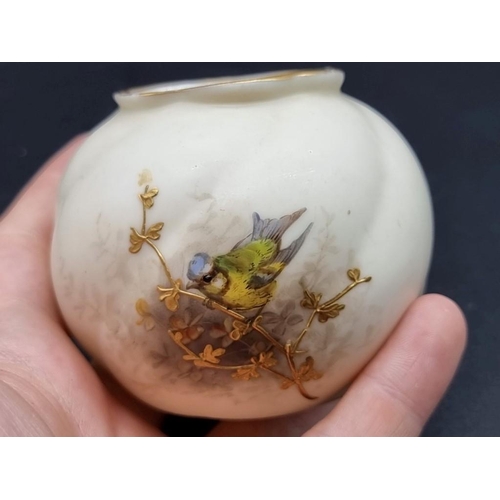 1254 - Three Royal Worcester and three Grainger & Co ovoid vases, each painted with a bird, 7cm high. (... 