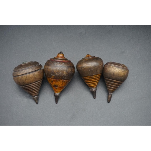 1263 - A small group of boxwood and treen plumber's turnpins, largest 9.5cm long.